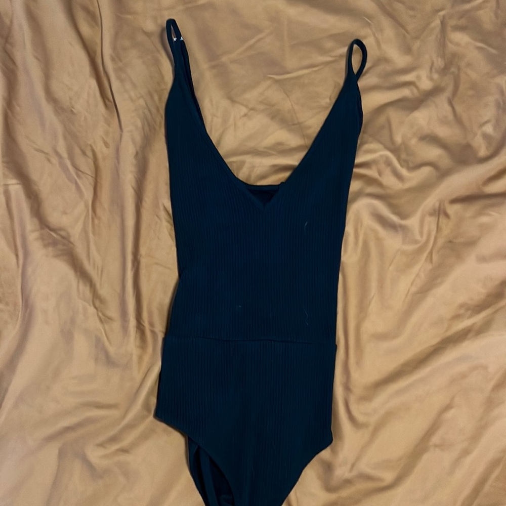 Black ripped body suit